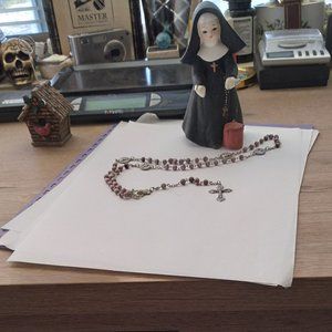 The catholic nun and italian made rosery